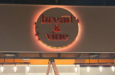 Bread and Vine round acrylic backlit logo sign