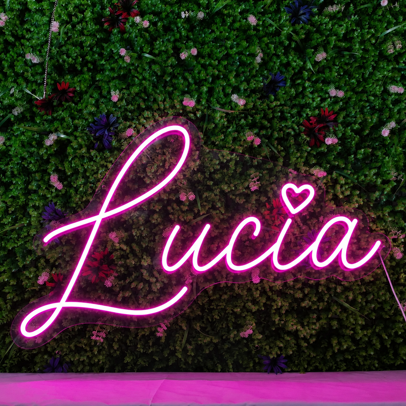 Custom neon sign Camilla in pink on clear acrylic, made by Volt Signs