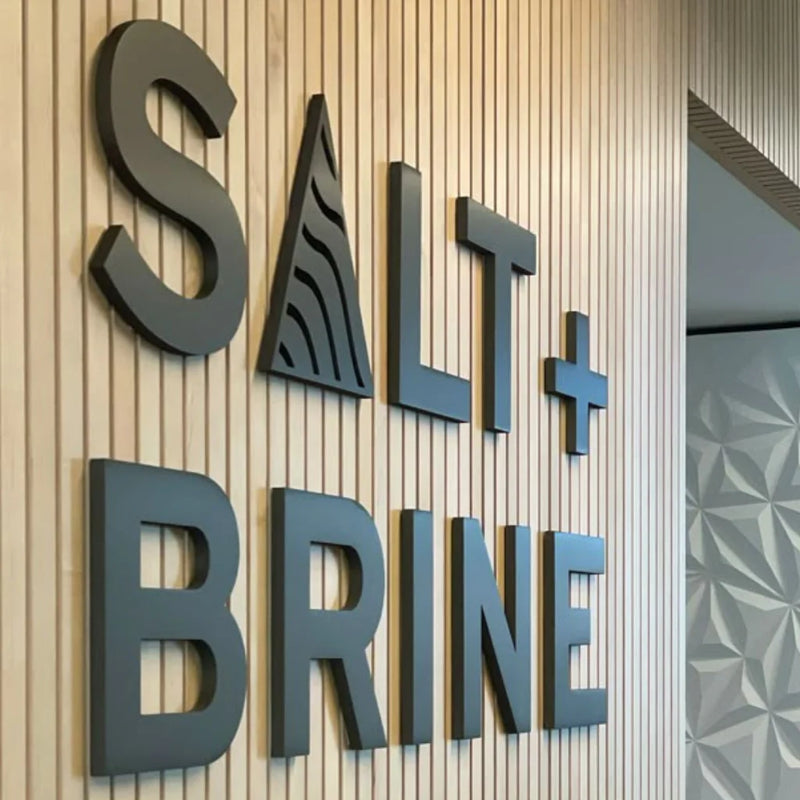 Salt and Brine custom acrylic cut logo sign for wellness brand